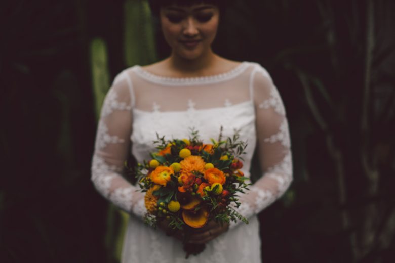 Portrait of the bride with her flower bouquet