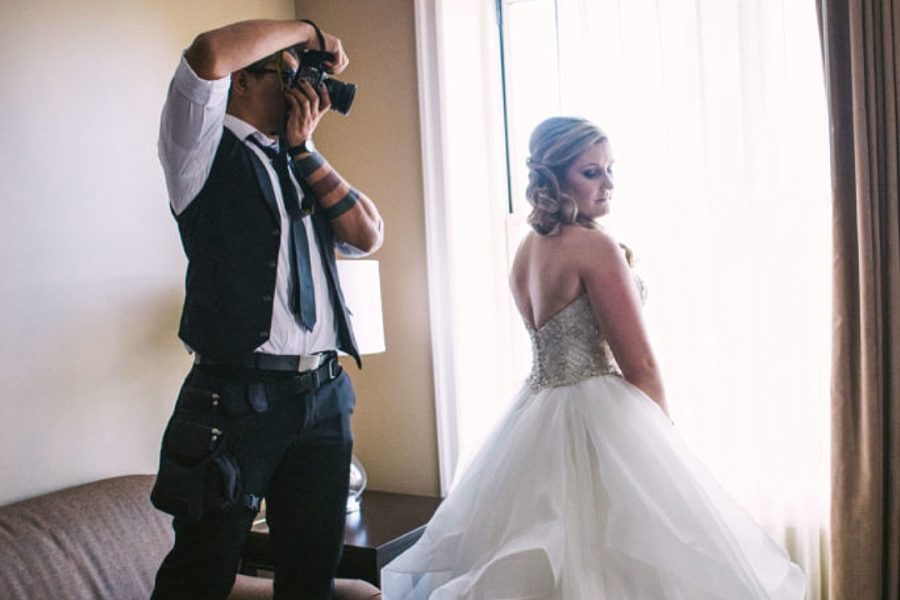 A hero wedding photographer taking bridal portraits