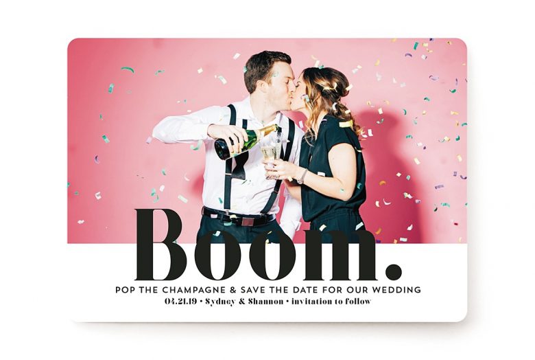 photo of a couple kissing and pouring champagne while confetti falls, on a save the date