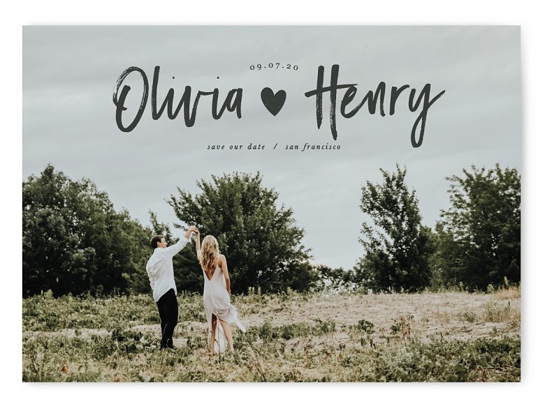 Vintage edited photo of couple dancing in a field, save the date