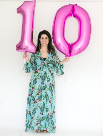 Meg Keene holding pink "10" balloons