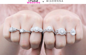 A Practical Wedding + Mia Donna banner above woman's fists outstretched, with diamond rings on each of her first three fingers on each hand
