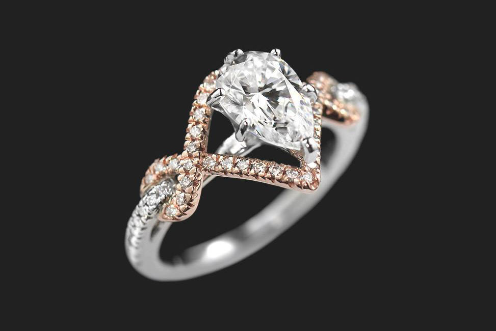 unique pear-cut two tone conflict-free diamond engagement ring