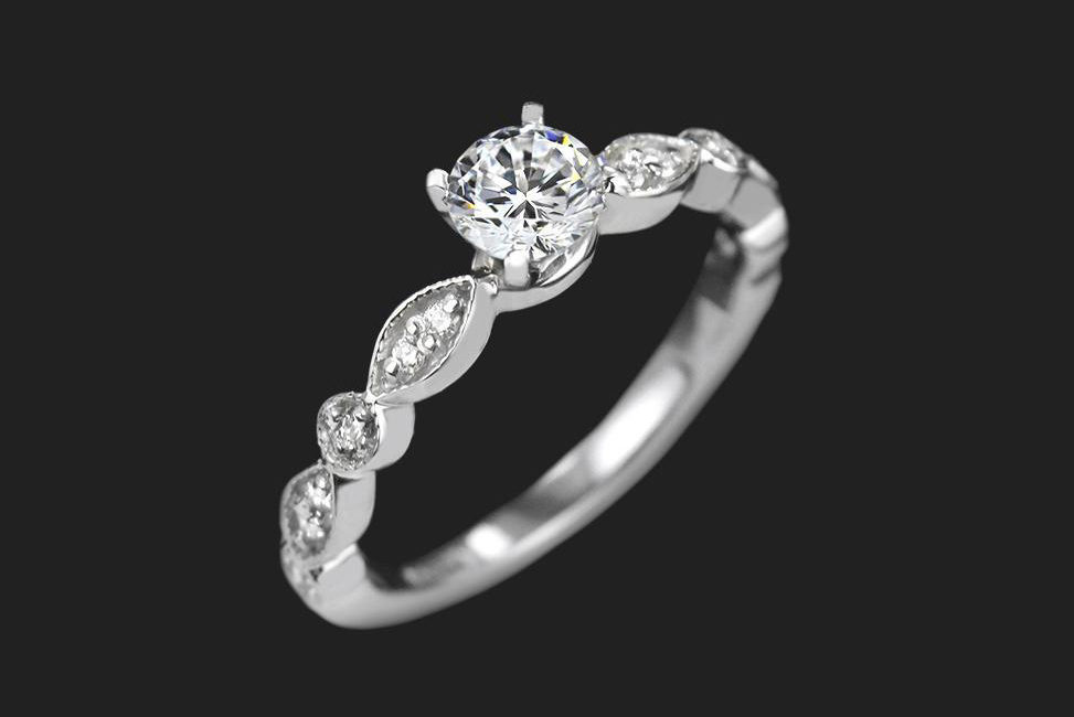 simple conflict free diamond engagement ring with unique band