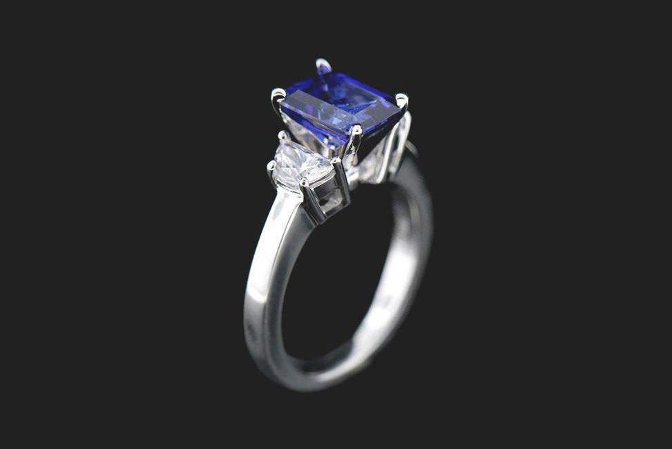 conflict free emerald cut blue sapphire engagement ring