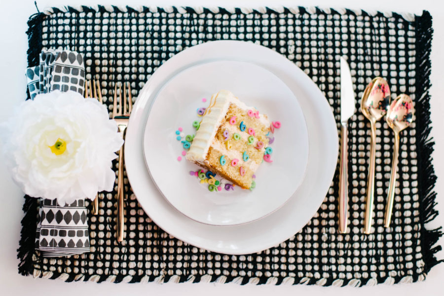 Slice of wedding cake on a plate for a wedding registry ideas post