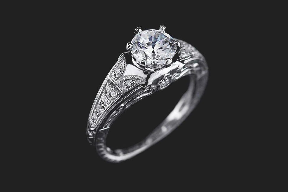 antique inspired diamond engagement ring with ethical round cut center diamond