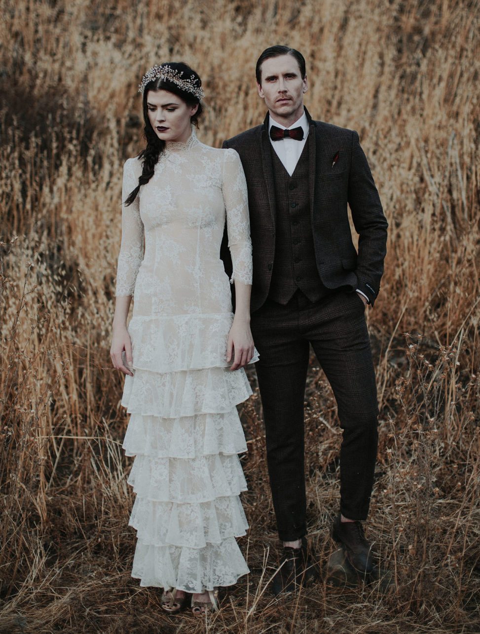 couple weaning vintage formal wear with moody editing