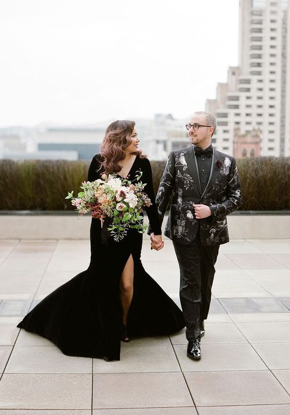 bride and groom wearing black formal attire