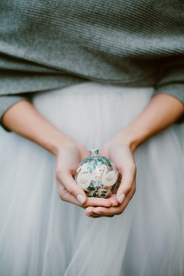 woman holding a decorative ornament