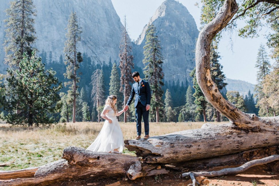 wedding couple posing for photos in forest
