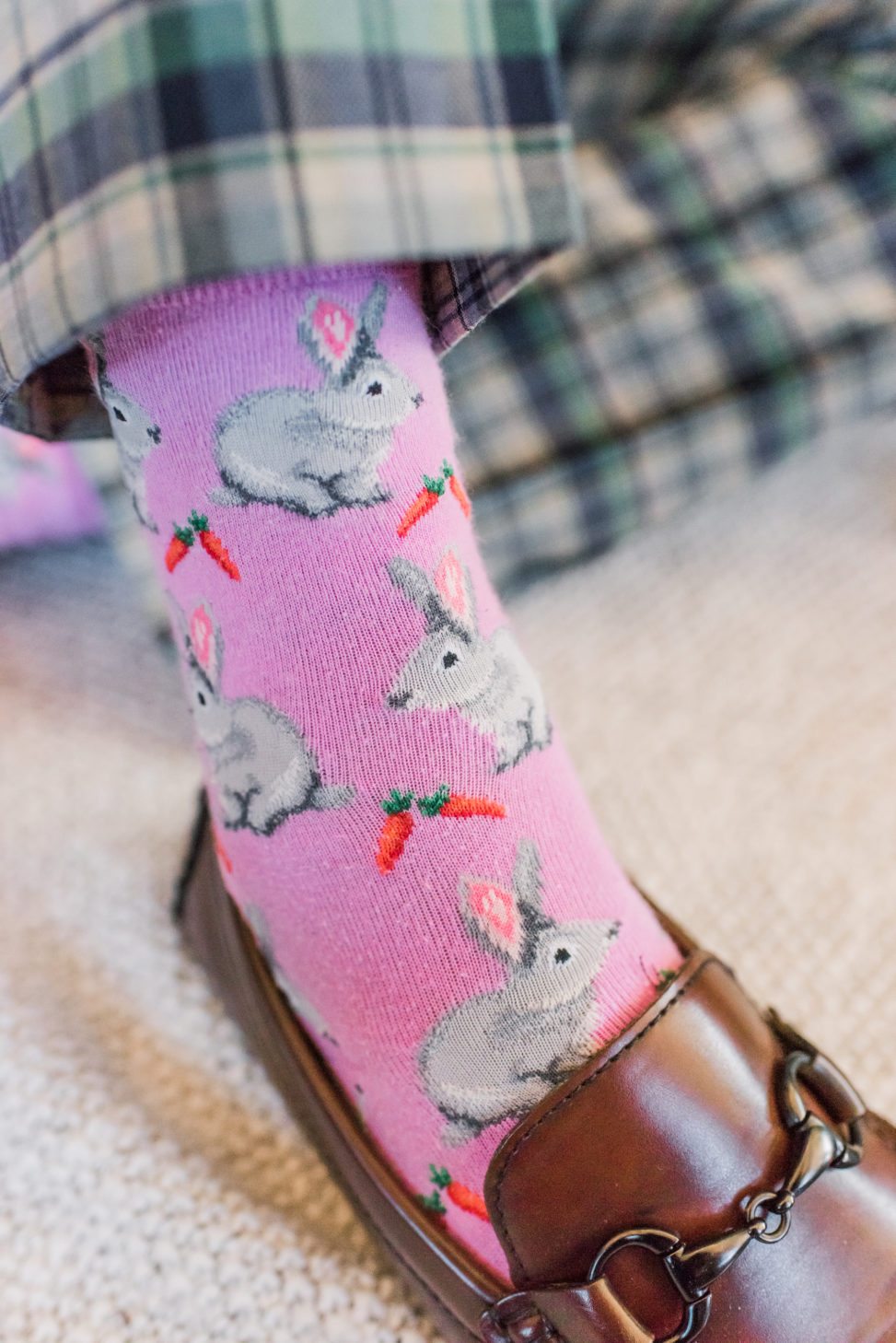 Close up of pink socks with grey bunnies