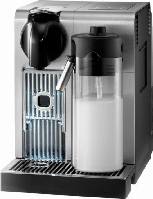 Espresso machine with milk bottle on white
