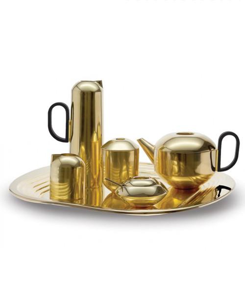 brass tea set on tray on white