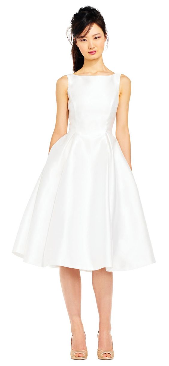 A midlength wedding dress with pockets