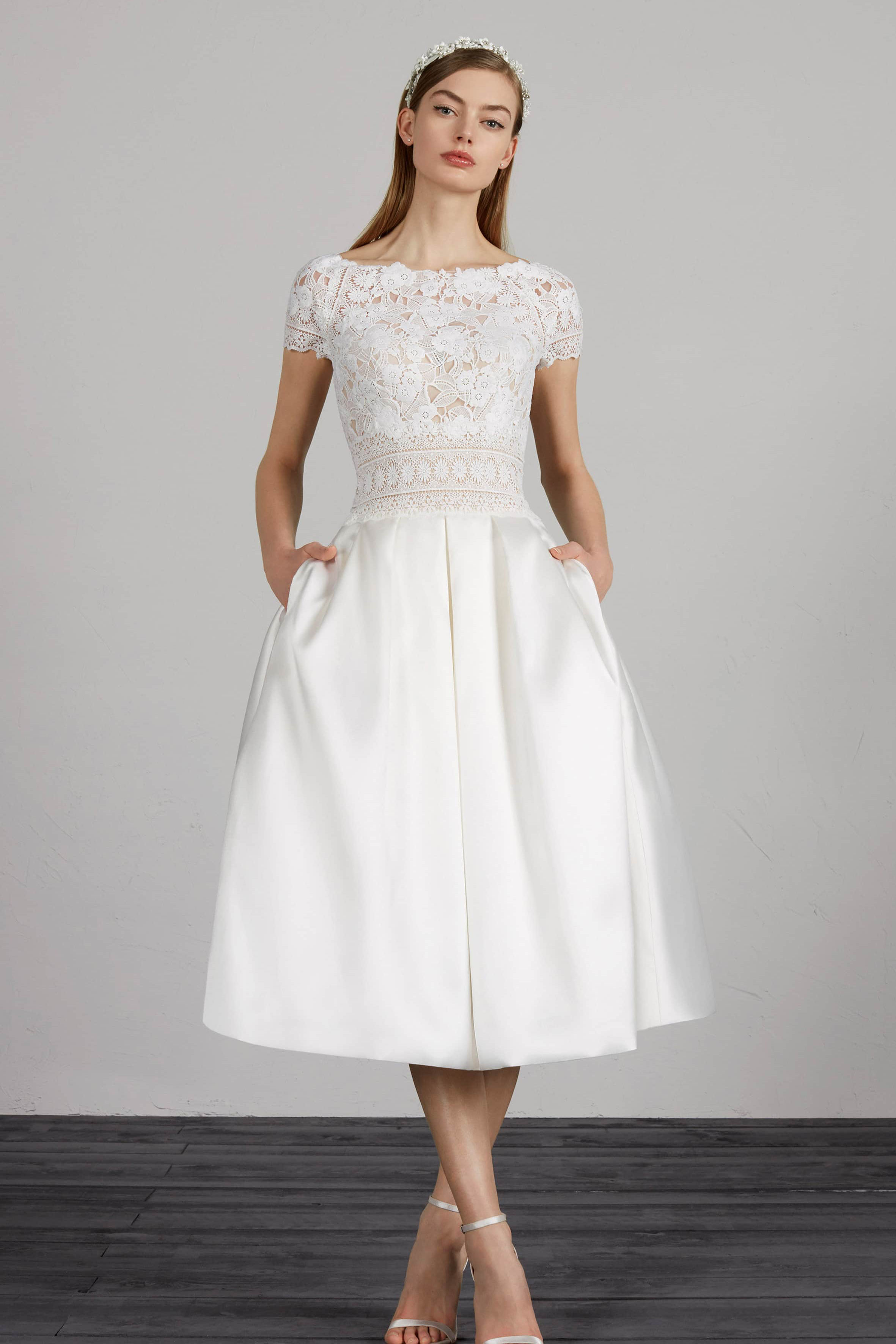 A knee length wedding dress with pockets