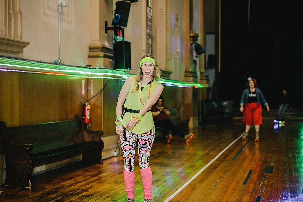 a woman roller skates with her mouth open