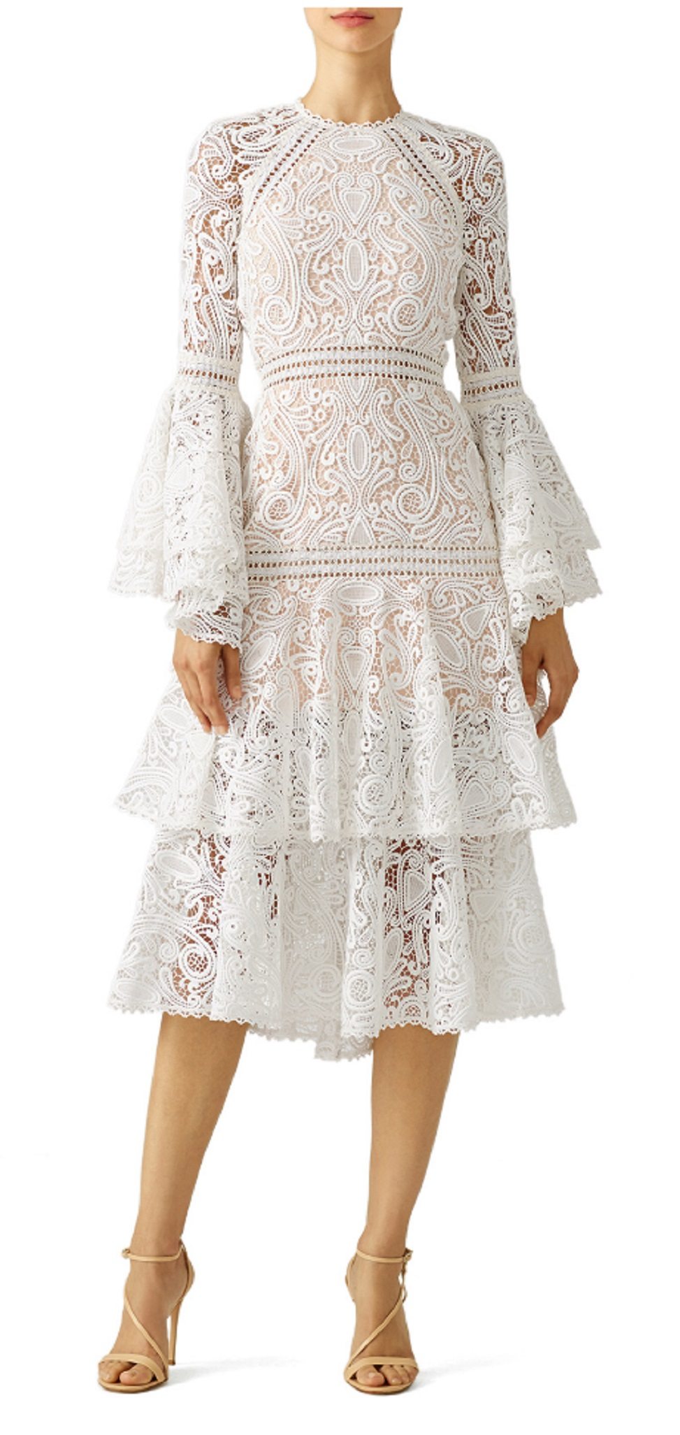 woman wearing an intricate white lace dress