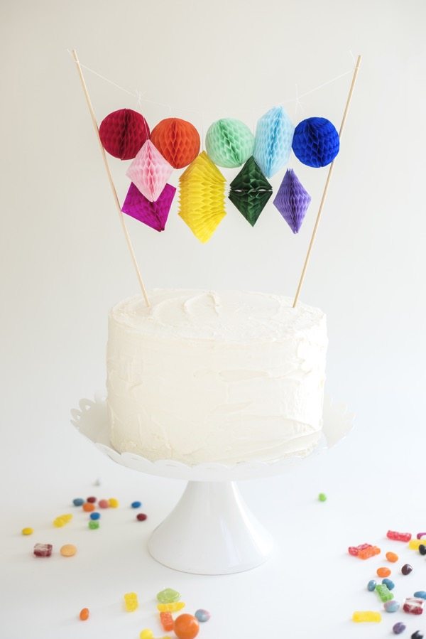 paper honeycomb cake topper—mini geometric shapes in a rainbow of bright colors