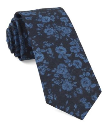 blue floral print on black tie
