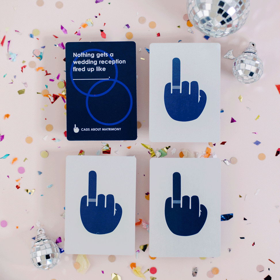 An animated photo of four cards from Cads About Matrimony, dancing around