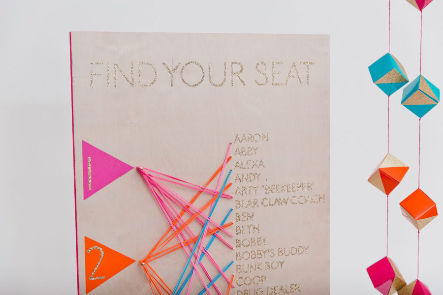 Colorful seating chart made with brightly colored rubber bands