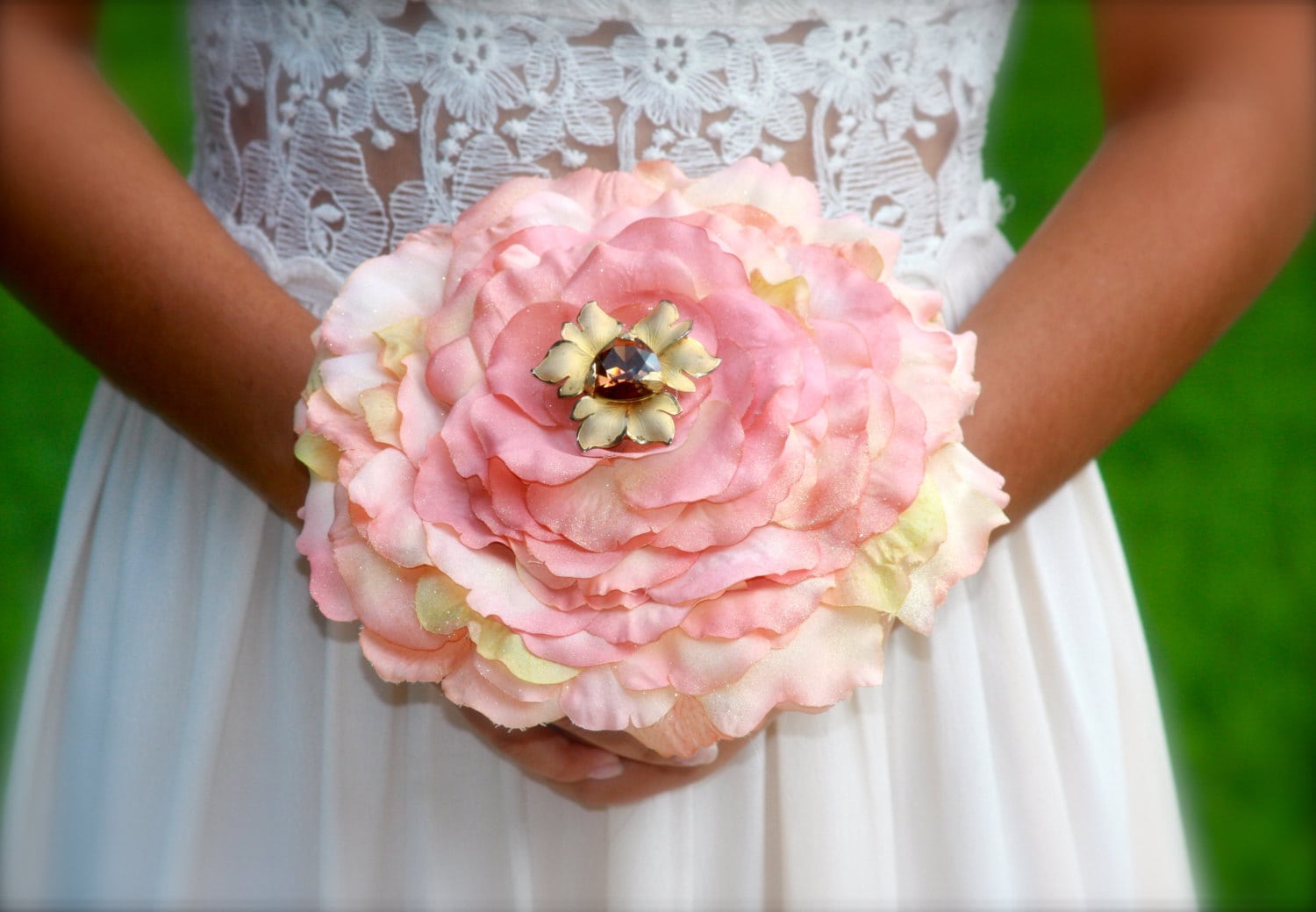 pink and white composite bouquet with jeweled center