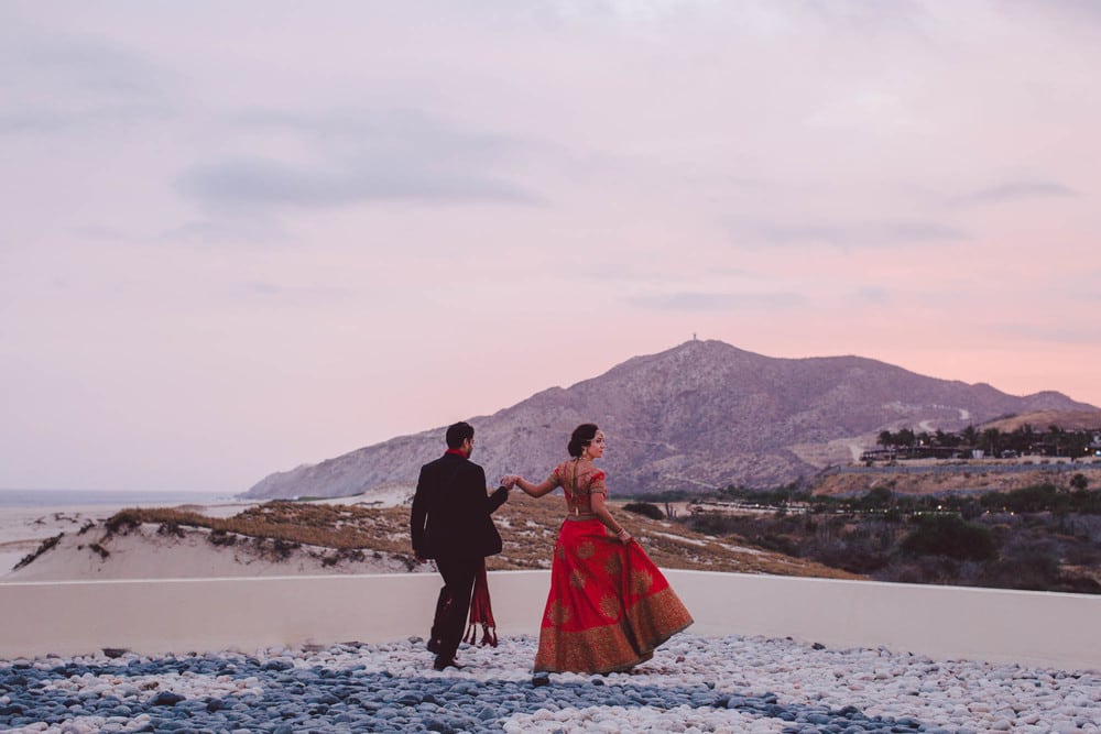 Indian beach wedding with a red dress