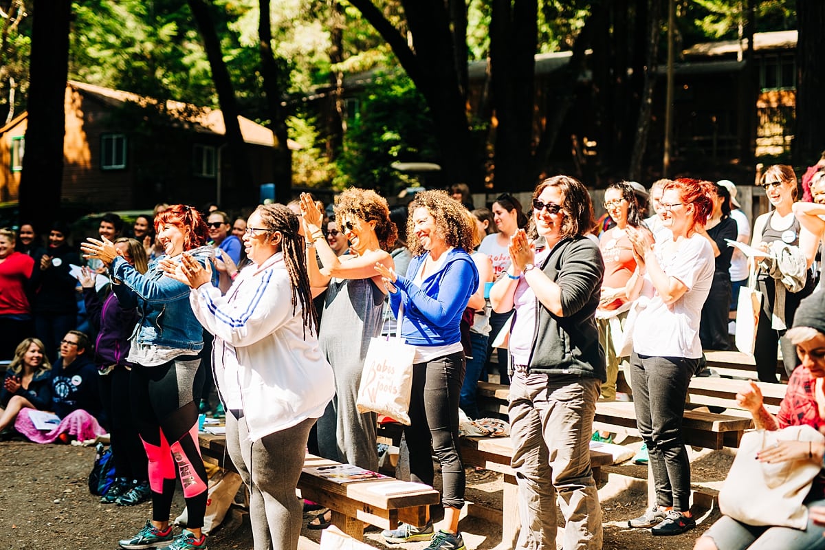 Women giving a standing ovation following Jay Pryor's workshop at the compact summer camp in la Honda, CA