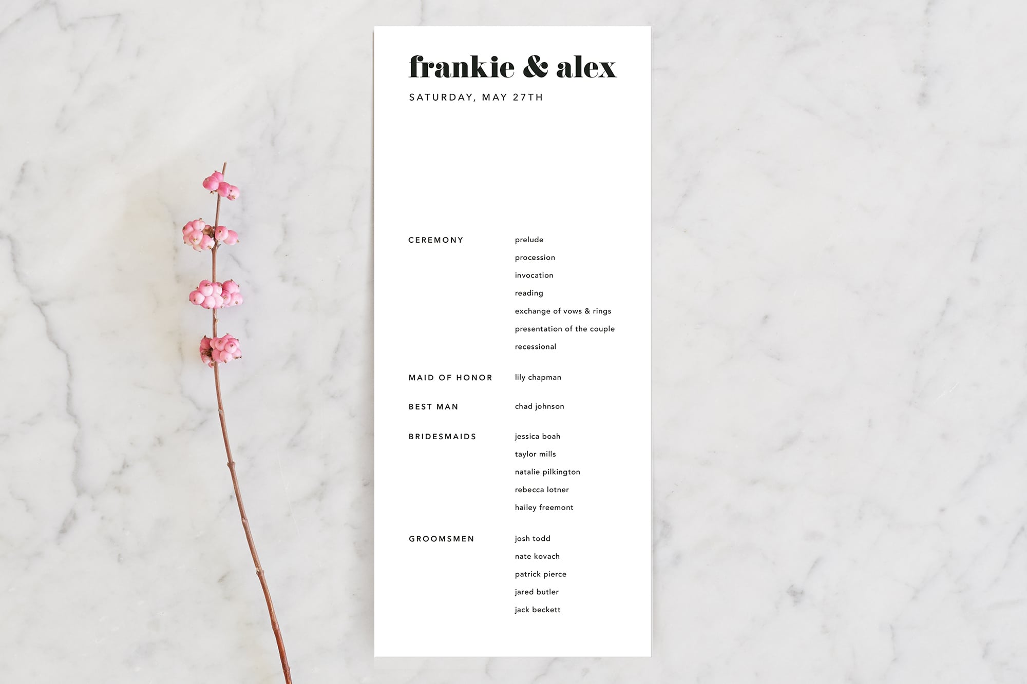 a black and white modern wedding program from minted with bold typography