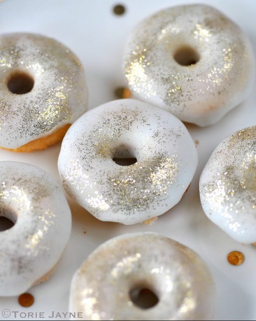 Winter wedding ideas for a sweet treat—Closeup of silvery white doughnuts