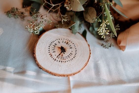 wedding ideas for custom wood coasters—reads "Dylan & Carlyn *1/13/2018*"