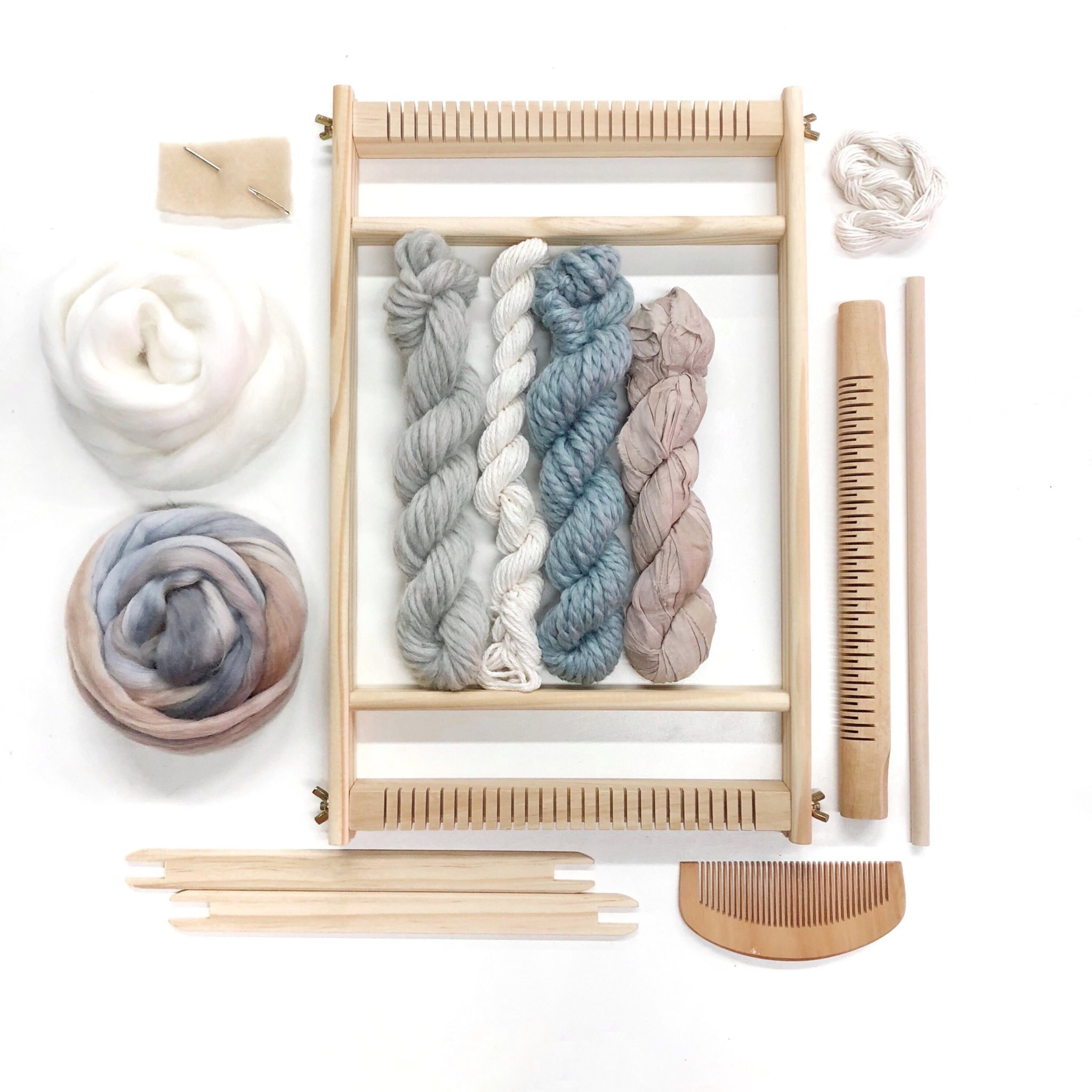 one of the best gift baskets for crafters filled with all of the supplies for beginning weavers