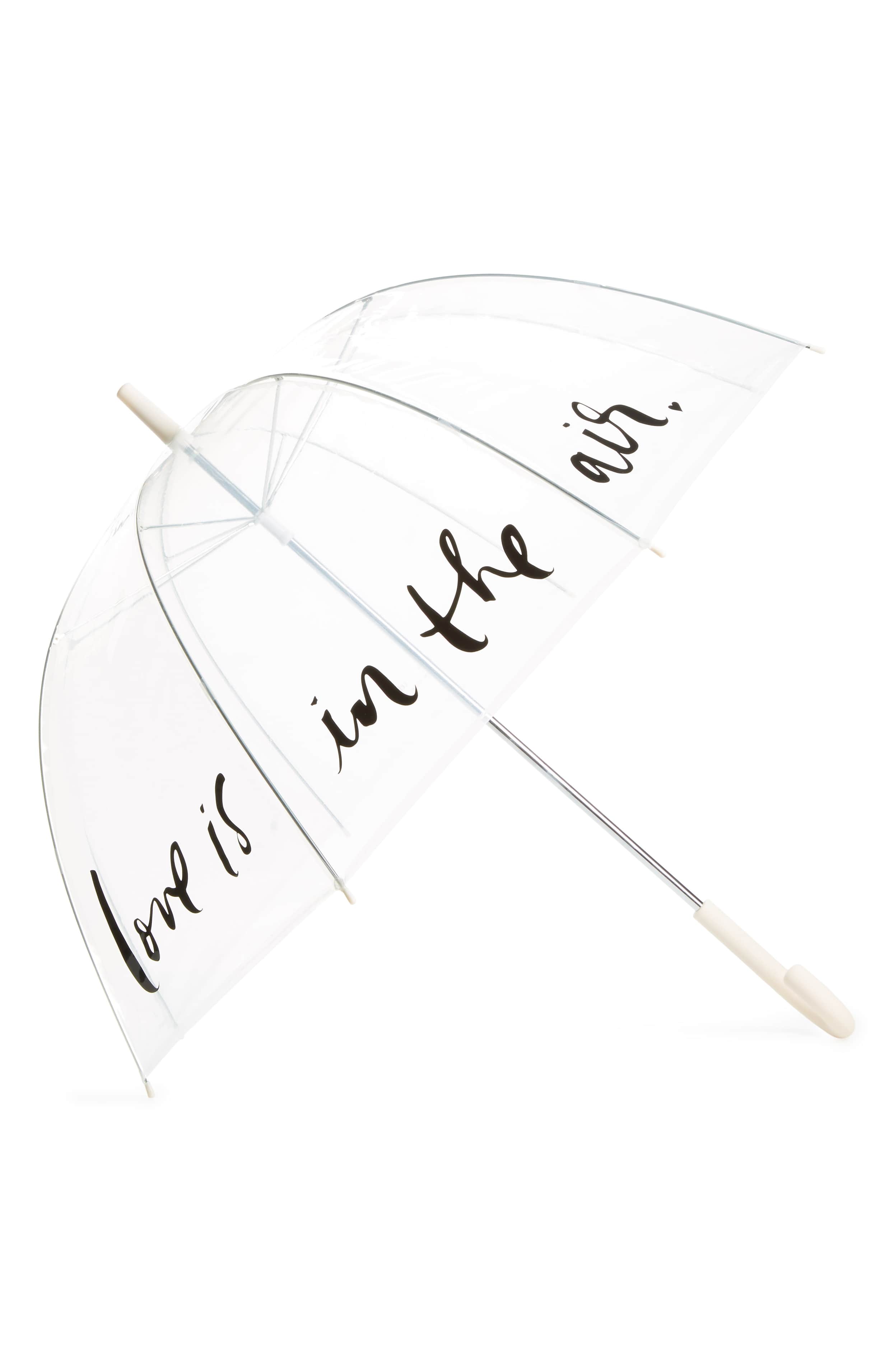 product shot of a clear wedding umbrella for rain with the words 'love is in the air' printed on it