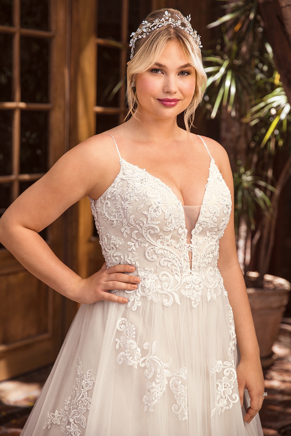 spaghetti strap plus size wedding dress with a plunging neckline from beloved by casablanca bridal