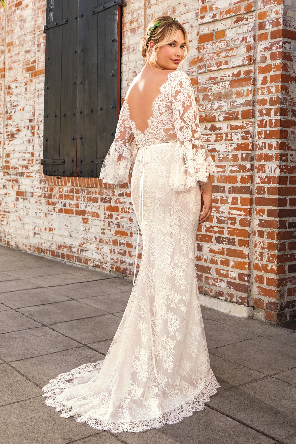 back view of the peyton long sleeve lace plus size wedding dress from beloved by casablanca bridal