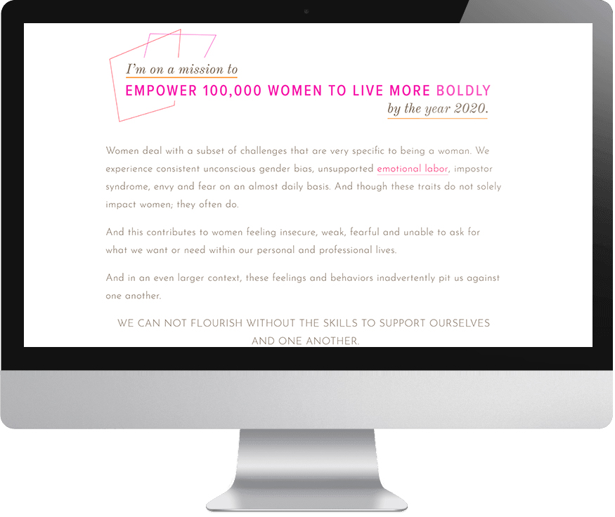 A page from Cyndie Spiegel's Squarespace website that reads "I'm on a mission to empower 100,000 women to live more boldly by the year 2020" as shown on a computer monitor 