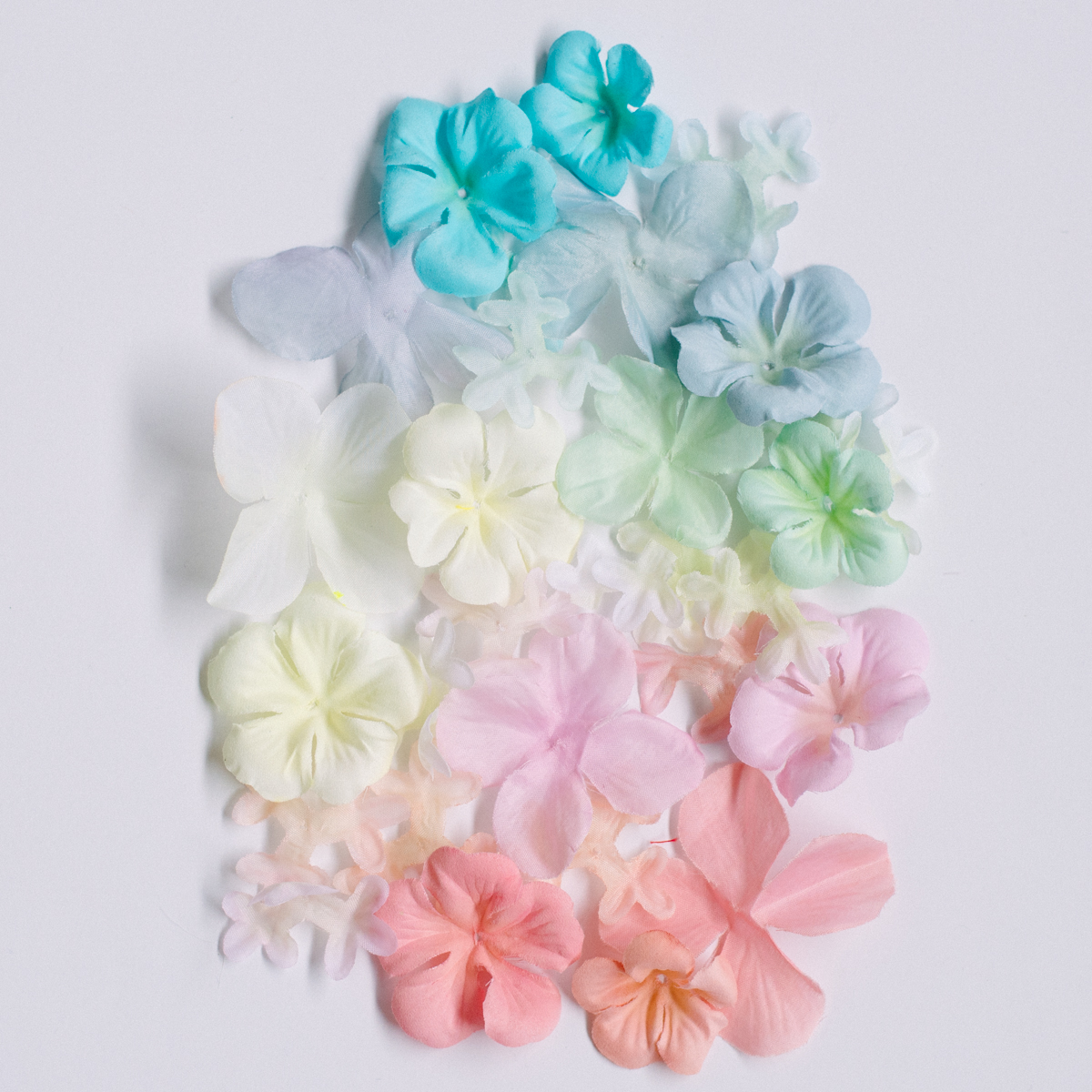 A colorful array of fabric flowers that have been dyed using Rit dye