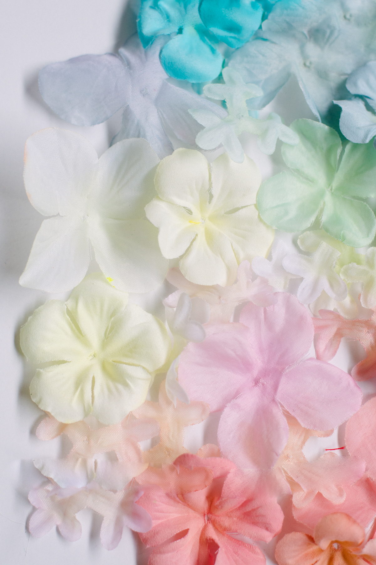 Close up of fabric flowers that have been dyed using Rit dye