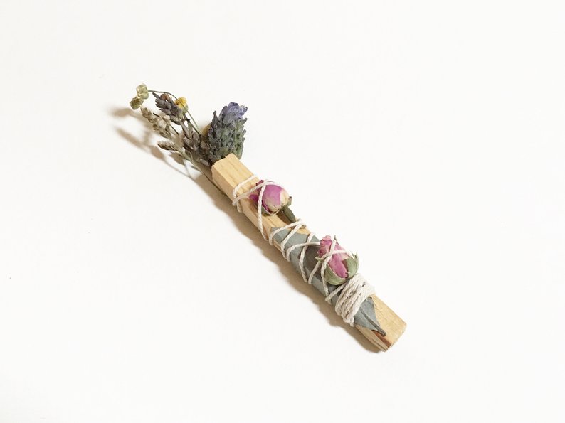 Bundle of florals and palo santo tied with twine for bridal shower favors