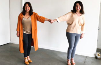 Two amazing women hold hands across a great expanse