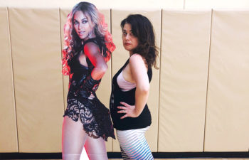 Meg and Beyonce posing together.