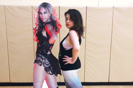Meg and Beyonce posing together.