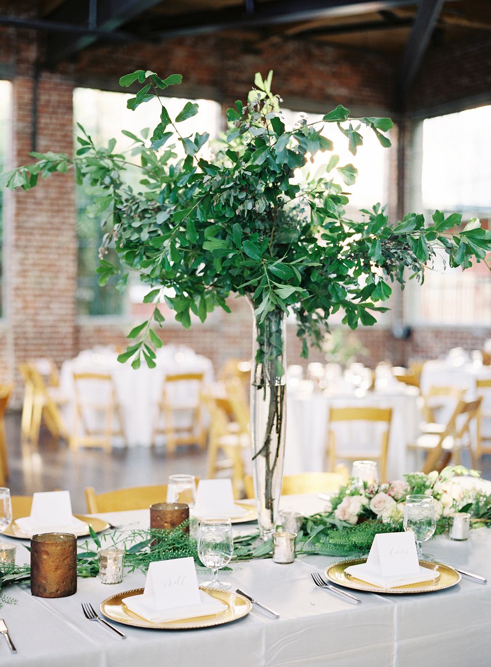 Greenery centerpieces which are branches stuff in a vase