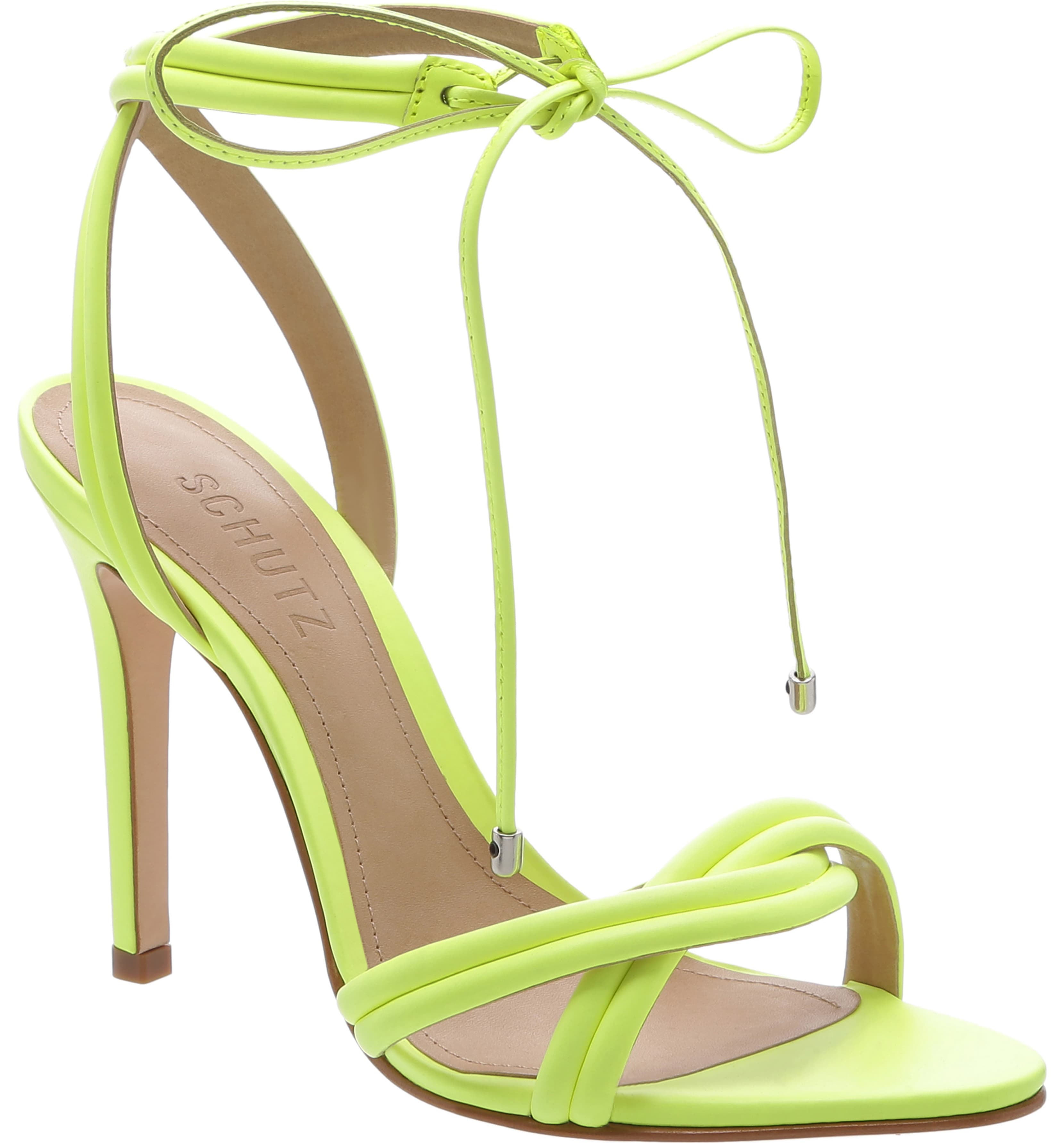 A lime green high heel shoe