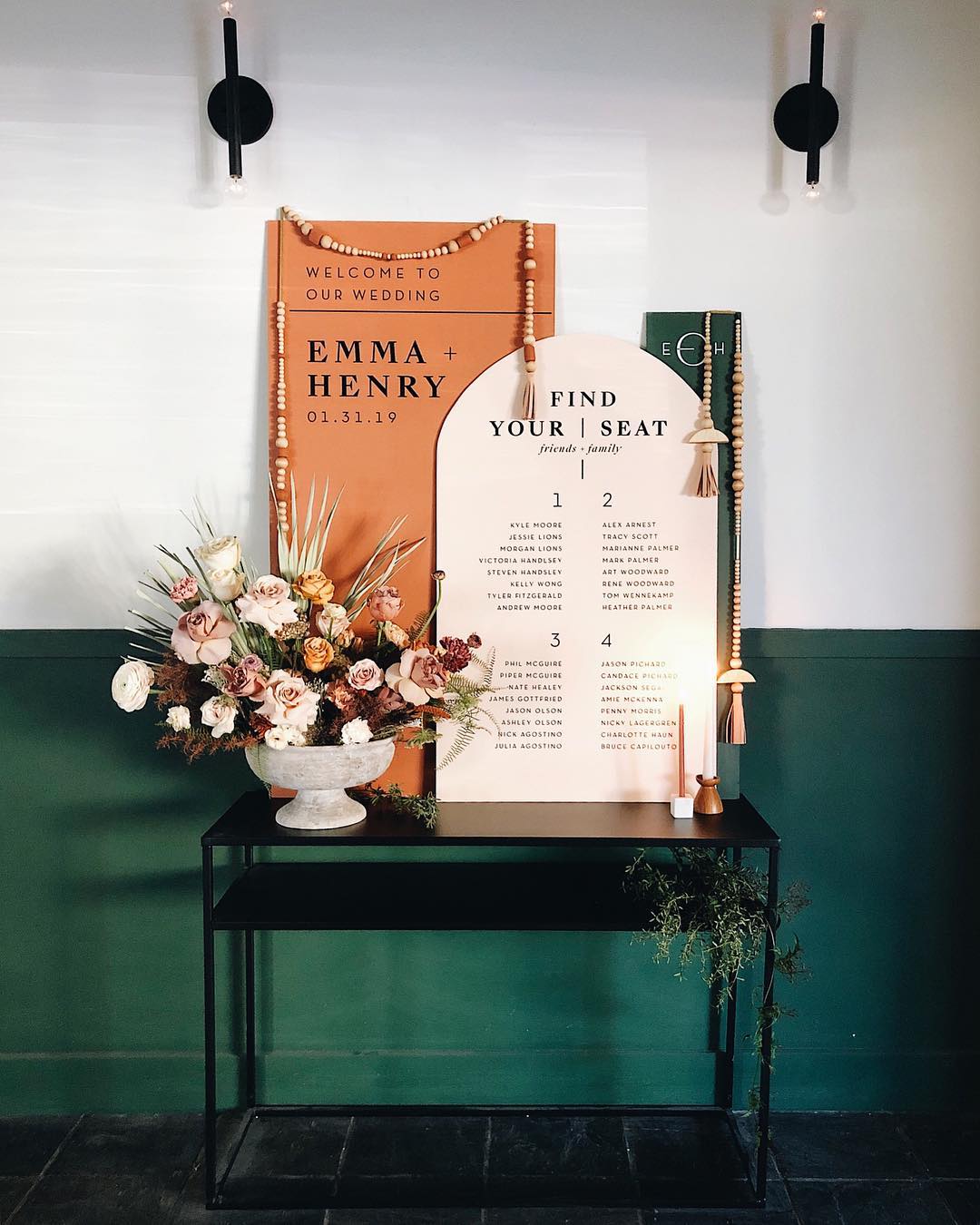 An informational piece with seat markers decorated in fall wedding colors