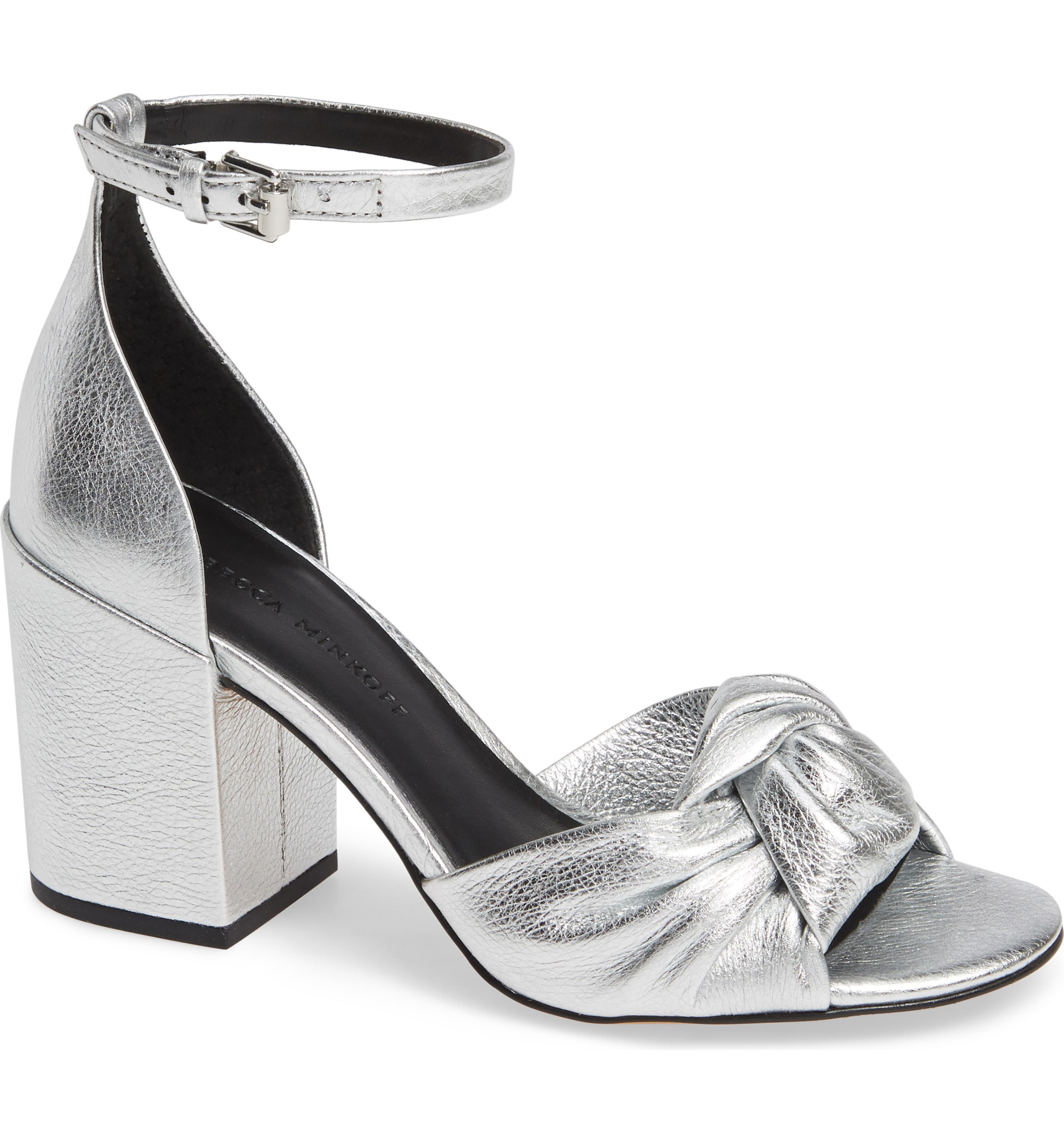 A silver high heel shoe