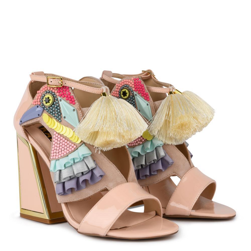 Tan platform sandals with a bird design on the side