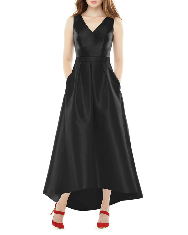 A model wears a v-neck sleeveless full length black dress.