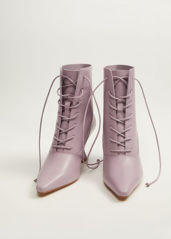 Lavender lace up boots.